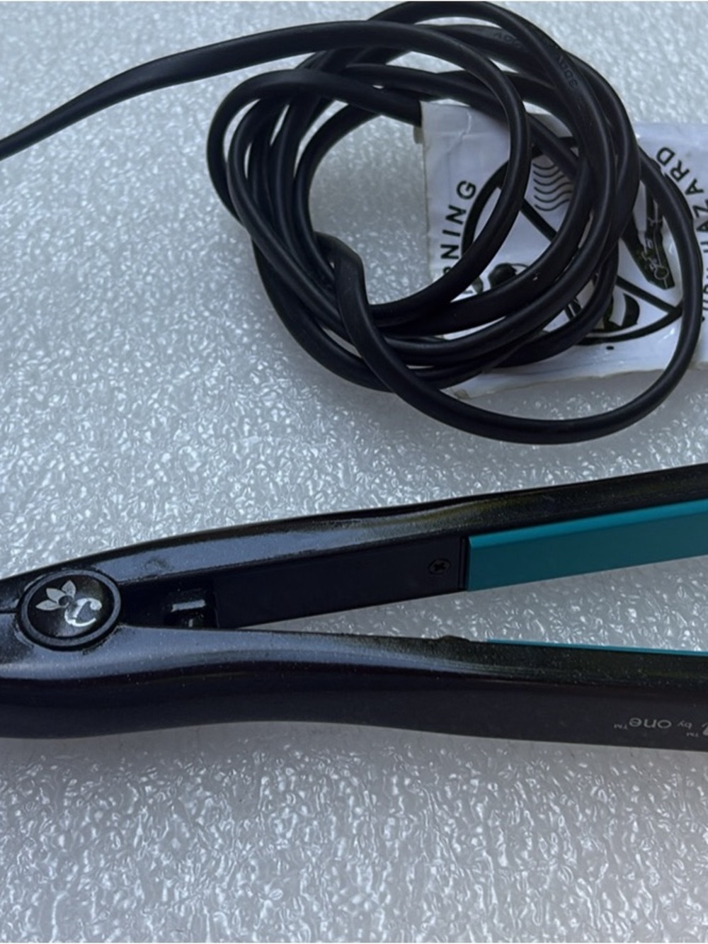 Black Hair Straightener with Teal Accents